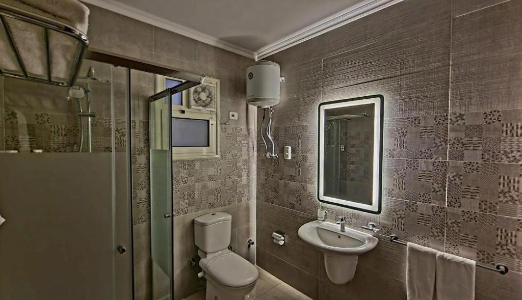 Grand Plaza Sheikh Zayed Hotel Kafr Abu 'umaydah Bagian luar foto